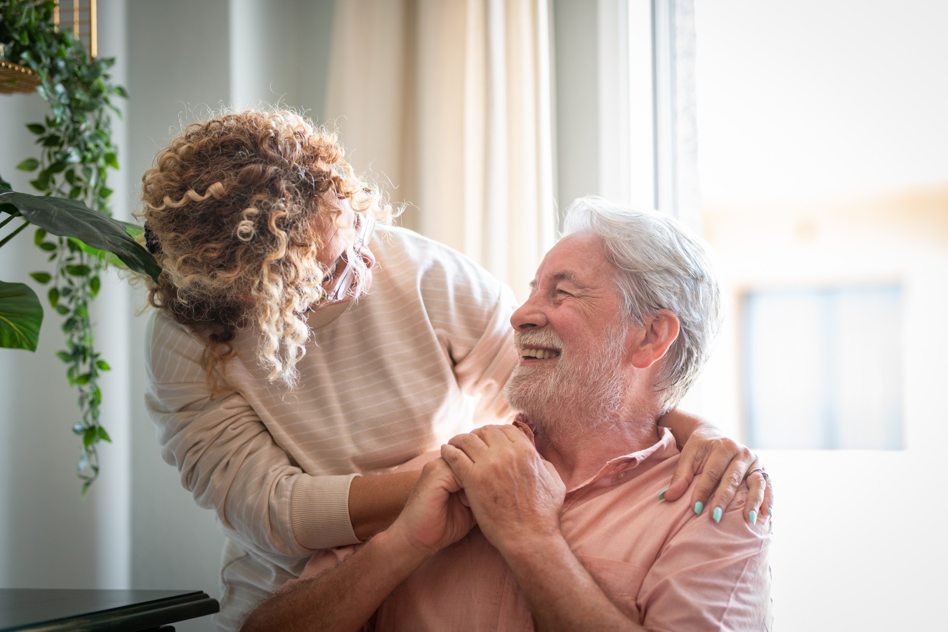 Caregiver supporting senior resident